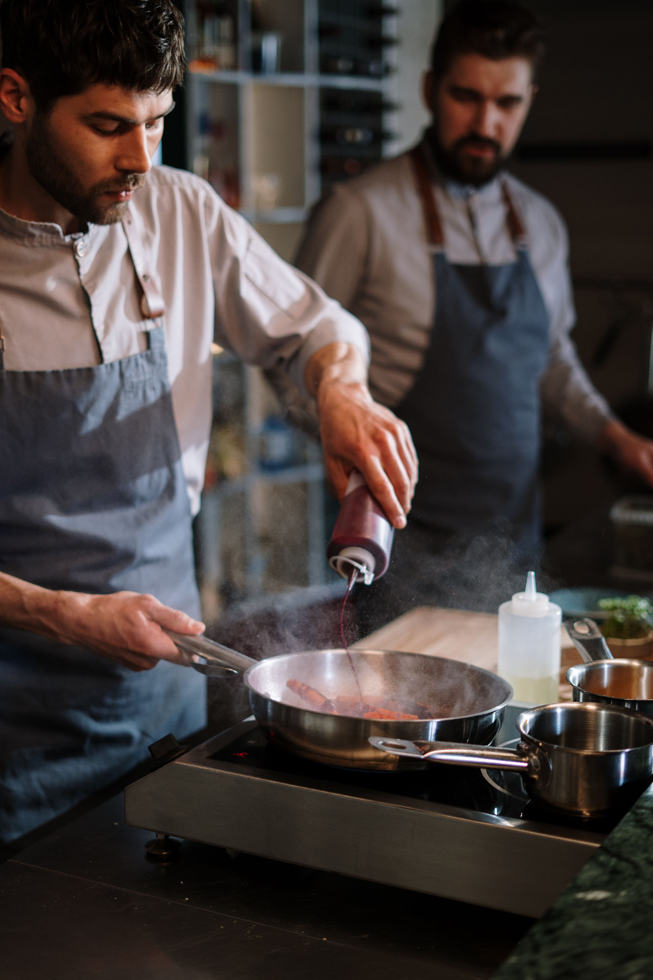 Chefs working the open kitchen at Gurmanai