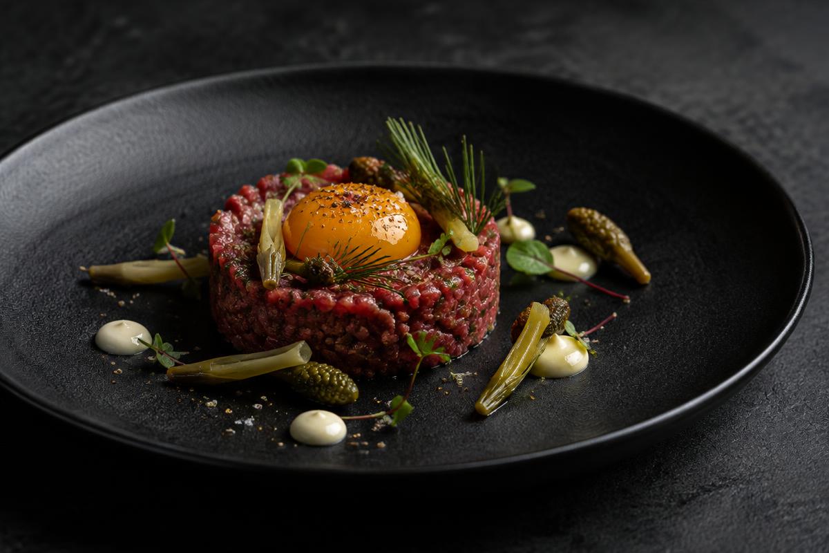 Veal tartare, pickled pine